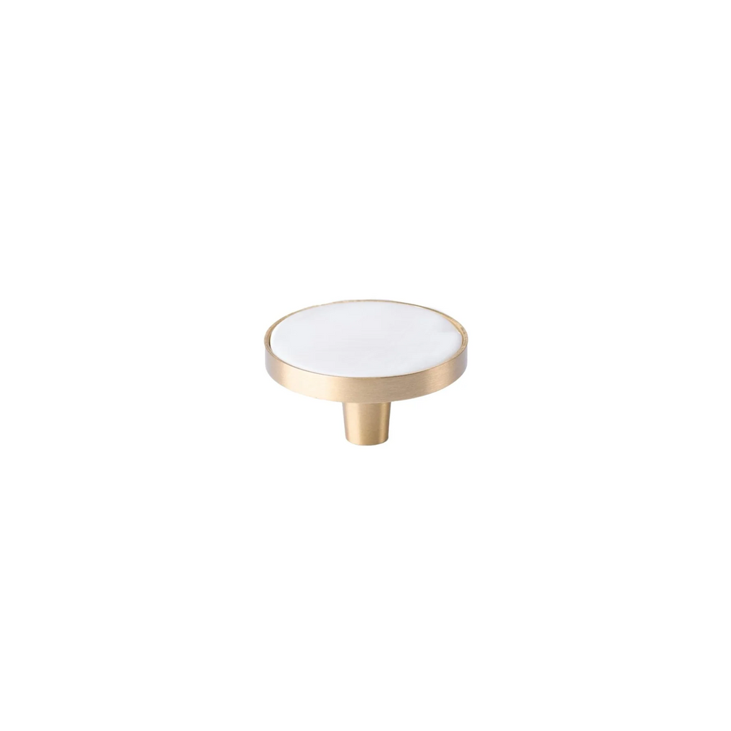 Brass Essence mother of pearl and brass round cabinet knob with elegant, shiny surface and vintage-inspired design.