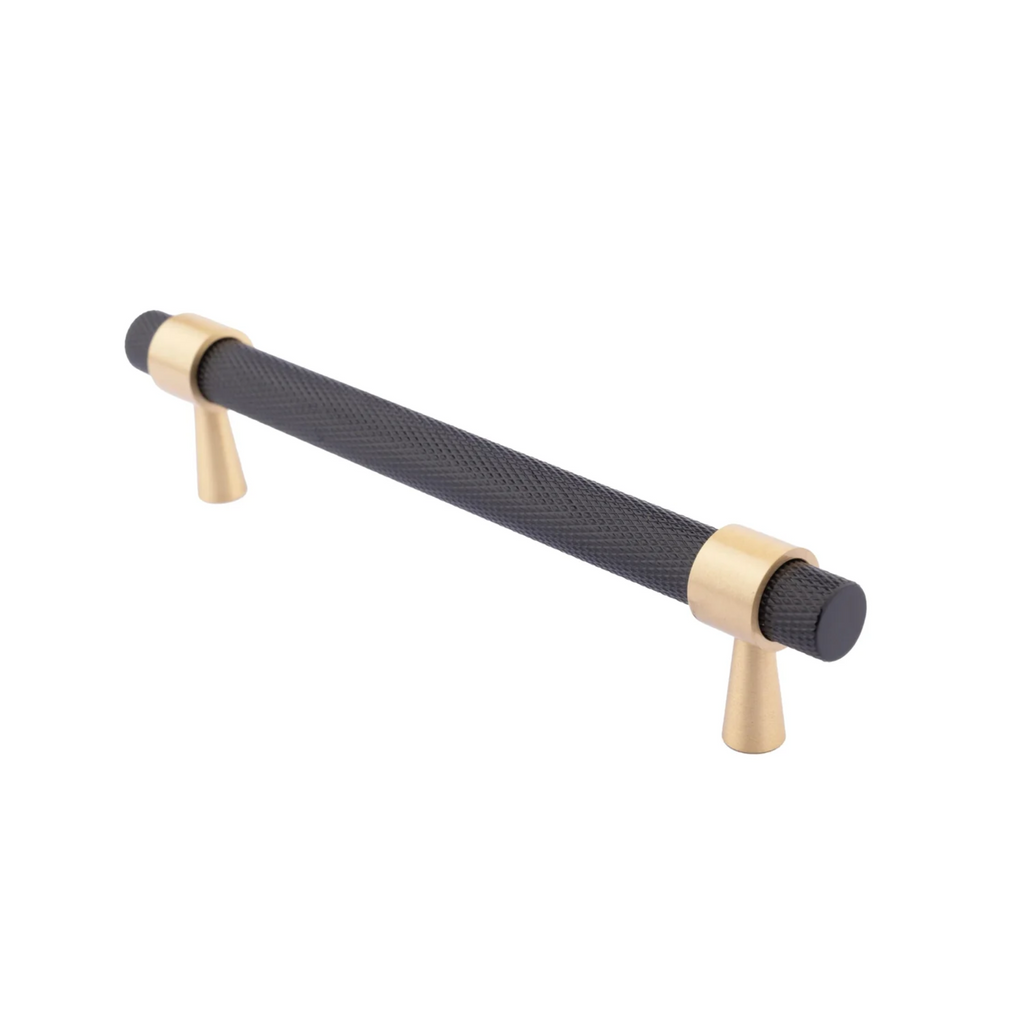 Brass Essence knurled black and gold T-Bar handle from the collection, showing the textured grip and sleek metal finish.