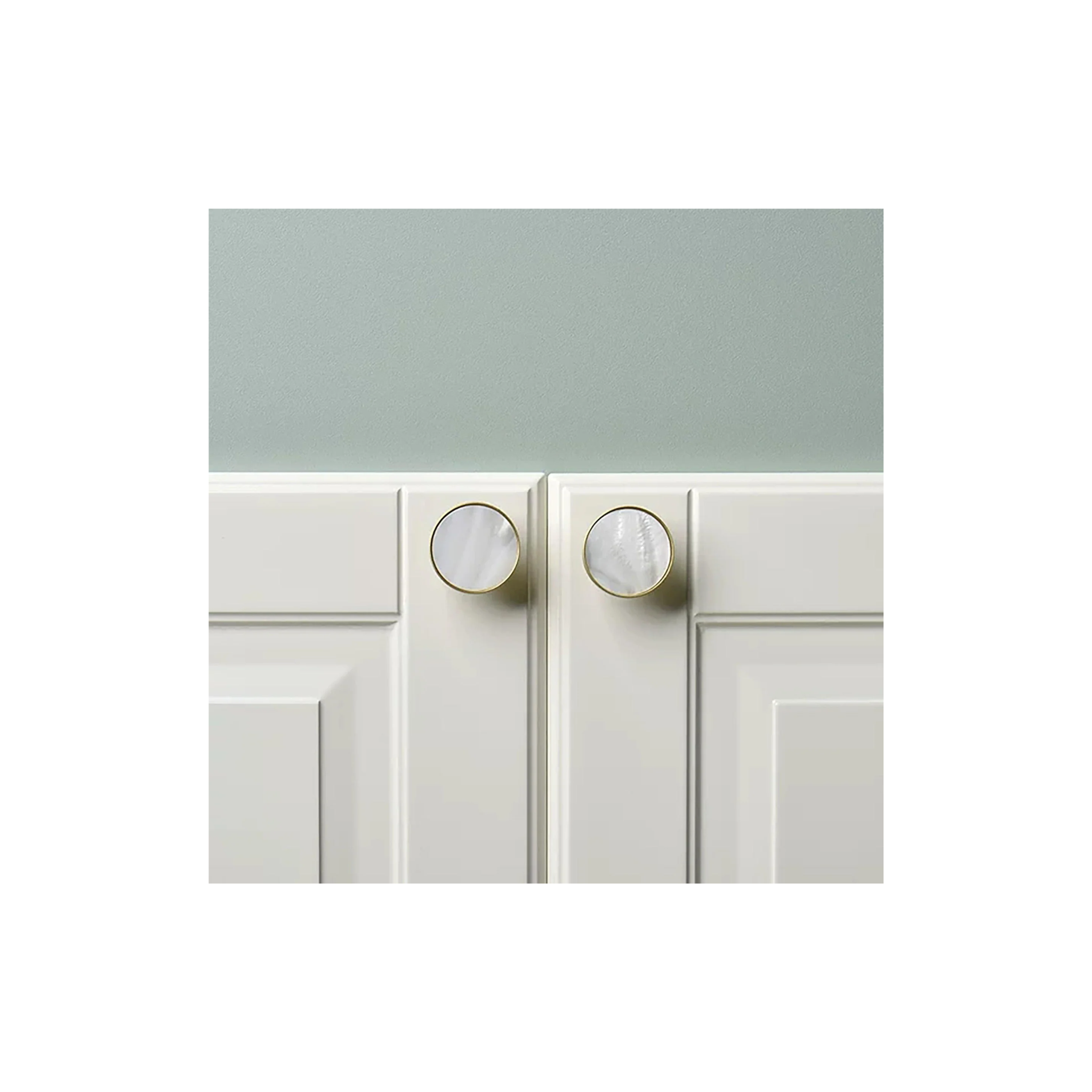 Mother of Pearl and brass round cabinet knob by Brass Essence, showcasing a polished, elegant decorative hardware piece.