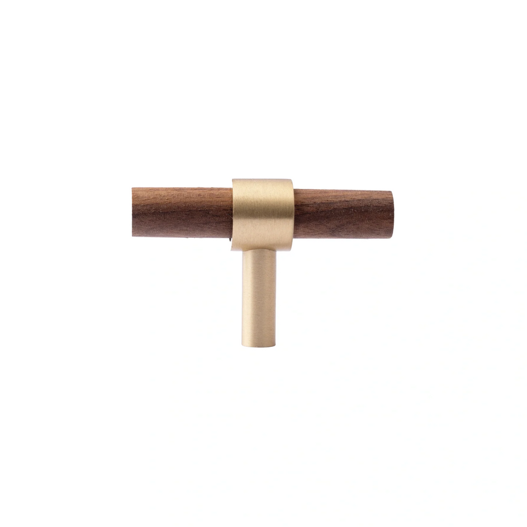 Brass Essence Walnut and brass T-bar handle from the collection, showing a close-up of the sleek, modern drawer handle design.