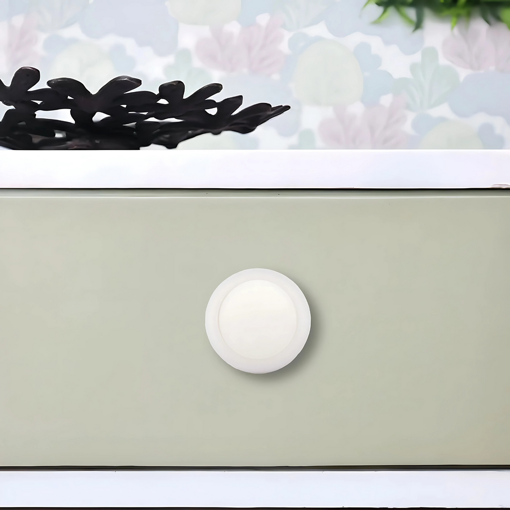 Brass Essence Soft-Touch Silicone and ABS cabinet knob, sleek silver finish, smooth surface, perfect for modern kitchen or bathroom cabinets