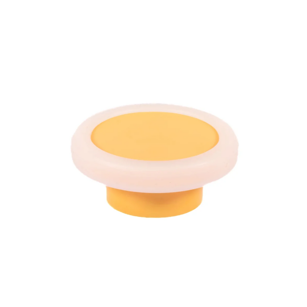Brass Essence soft-touch silicone and ABS cabinet knob with sleek design, ideal for modern kitchen or bathroom cabinets.