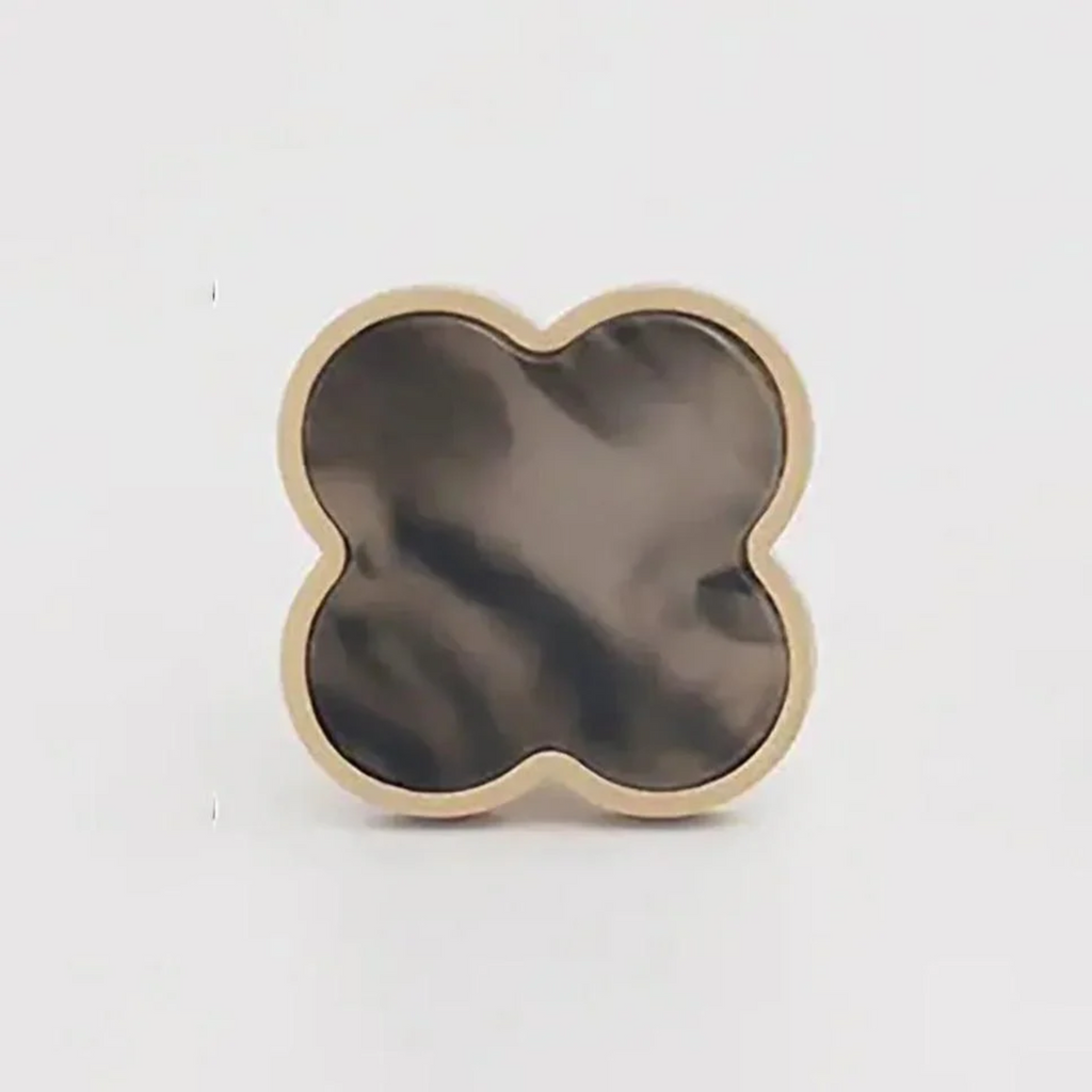 Brass essence Clover Brass Cabinet Knob from the Collection, showcasing a polished brass finish and elegant design for furniture.