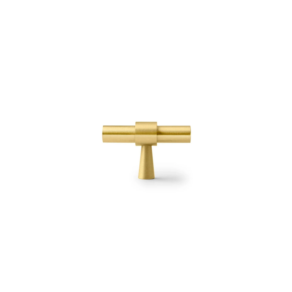 Brass Essence Naveena solid brass T-bar handle in a sleek, polished finish, designed for furniture and cabinetry.