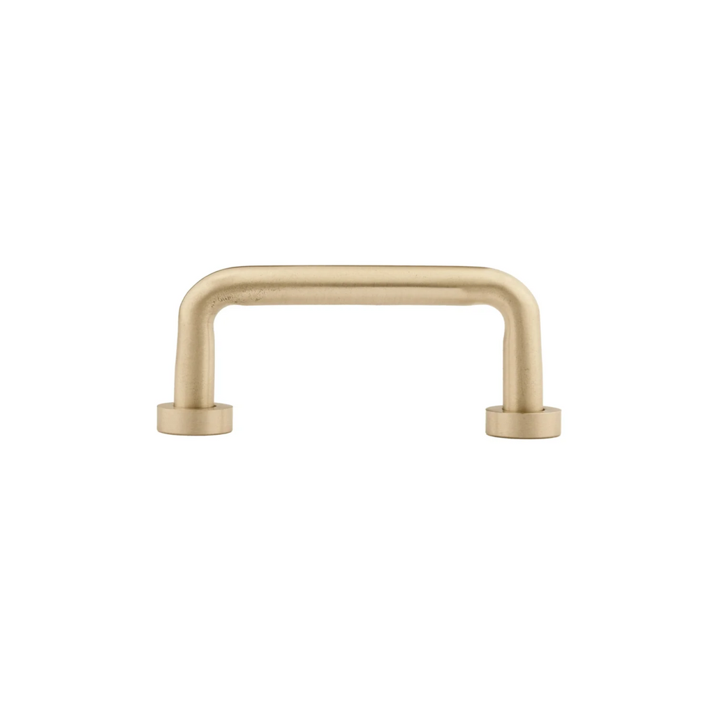 Minimalist Brass Essence solid brass curved handle with smooth finish, suitable for furniture or cabinetry.