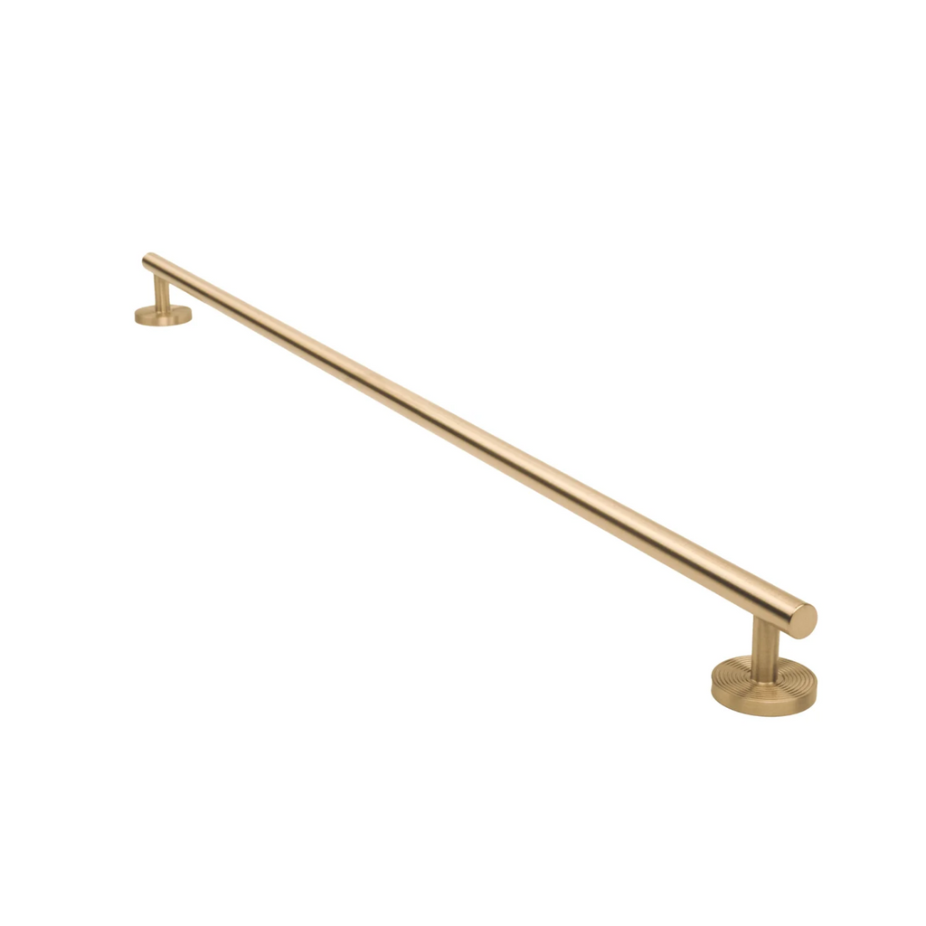 Minimalist Brass Concentric Ring Handles by Brass Essence, showing a set of sleek, gold-toned handles with concentric ring design.