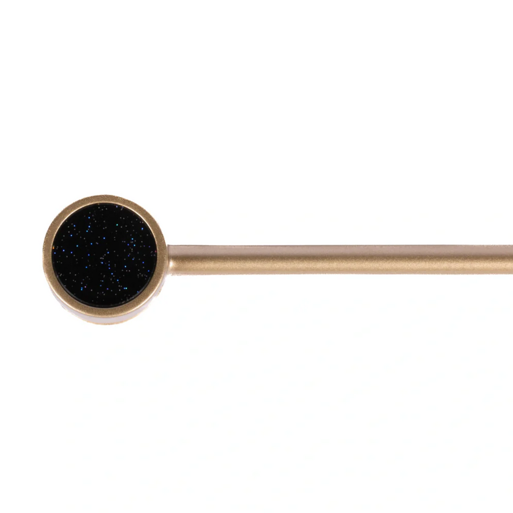 Brass Essence Bifocal Articulated Zinc Alloy Cabinet Pull with adjustable design and polished finish, mounted on a cabinet door.