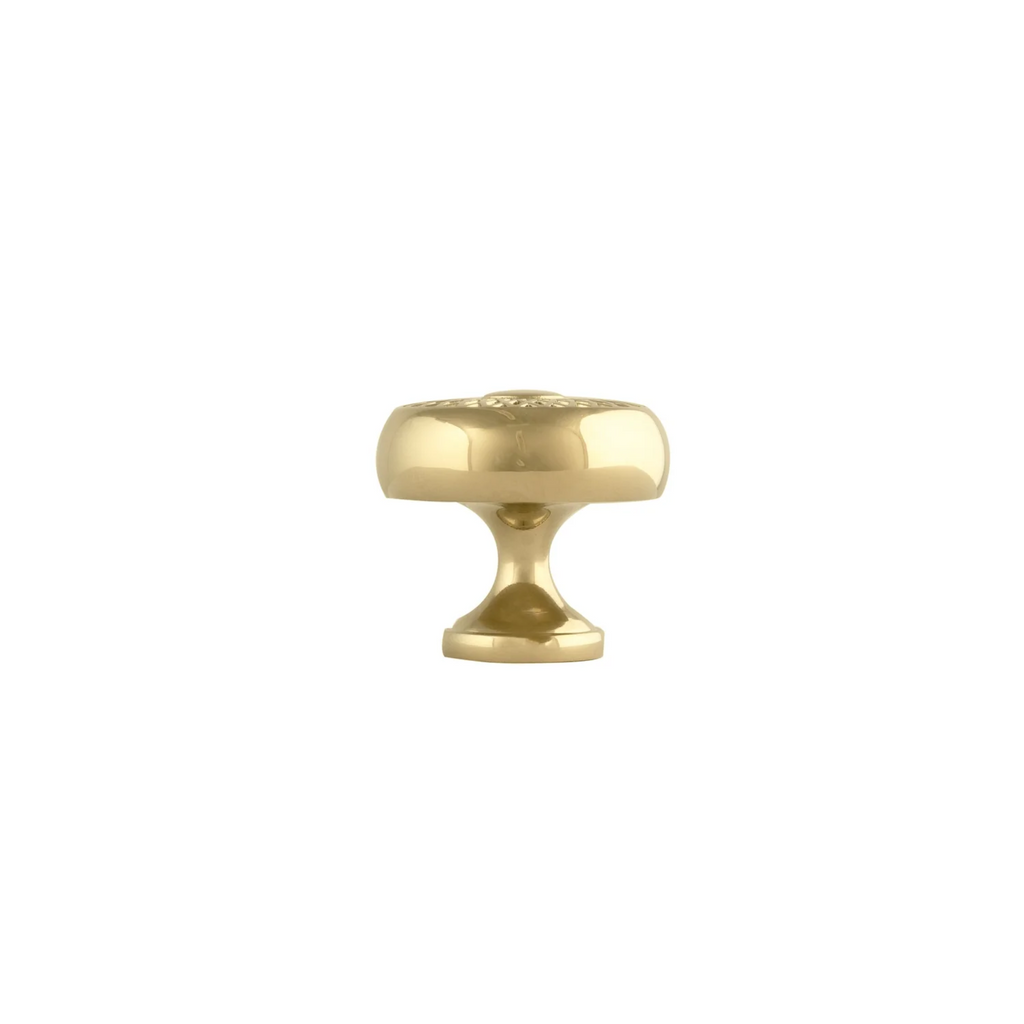 Polished brass Mahi Amerock lattice knob by Brass Essence showing intricate geometric design and smooth finish.